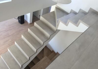 Looking from the first floor down to the cellar stairs